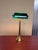 This classic banker’s lamp is crafted from solid brass and features a traditional green Vianne glass shade. The lamp is...