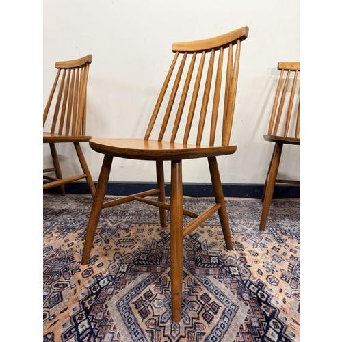 Set of four mid-century Scandinavian dining chairs made from solid teak wood. These are good, heavy-quality chairs with...