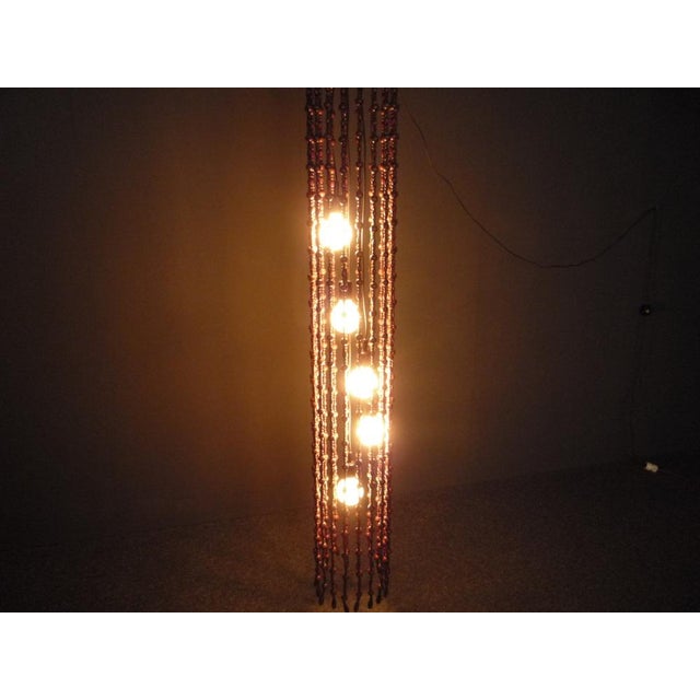 Elegant Ceiling lamp from Temde Switzerland. Wood Beads. Functional and complete. The lamp has a power cable with a plug....