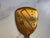 Pretty mid-century hand mirror as found on a ladies vanity. Floral pattern. Made of metal and glass. Mid-20thcentury.