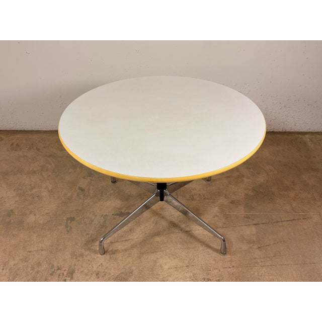 The Herman Miller table is in good condition with slight signs of wear. This piece has an attribution mark, I am sure that...