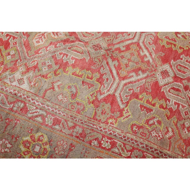 an all-over Infamous Crab design highlights this antique oushak large room-size rug from the early 20th century Details...