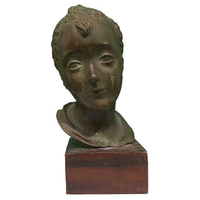 Bronze sculpture with green glaze and wooden base by the Italian sculpture Attilio Torresini (1884-1961). Signed on rear:...