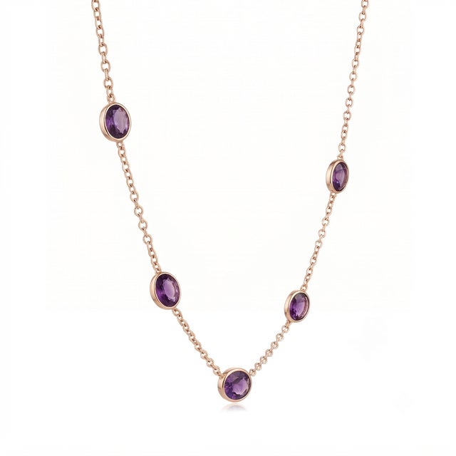 Infuse your style with a touch of elegance with this beautifully crafted station necklace. Designed for those who...