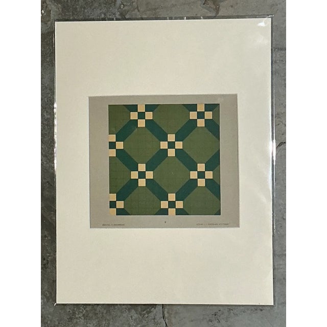This vintage serigraph presents a striking geometric tile pattern rendered in rich shades of green, accented with cream...