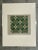 This vintage serigraph presents a striking geometric tile pattern rendered in rich shades of green, accented with cream...