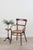 Edwardian bentwood occasional chair with a hand-tied cane seat, curved bentwood frame, and lightweight silhouette.
