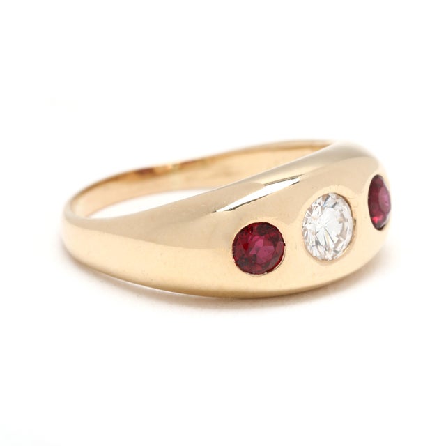 Stones: diamond round brilliant ct 4.2 mm approximately .25 total carats GH color/ VS2 clarity ruby round 3.2 mm...