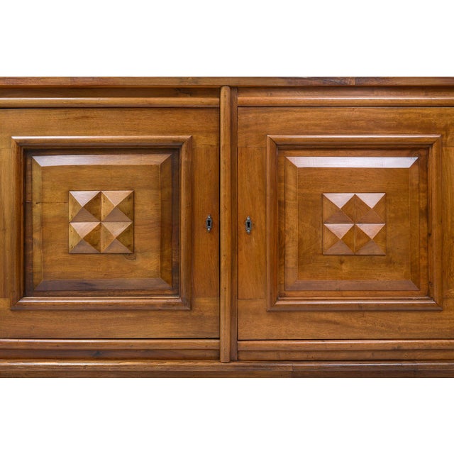 Bespoke French Mid Century-inspired sideboard with three doors and shelves. Excellent Construction. This sideboard can be...