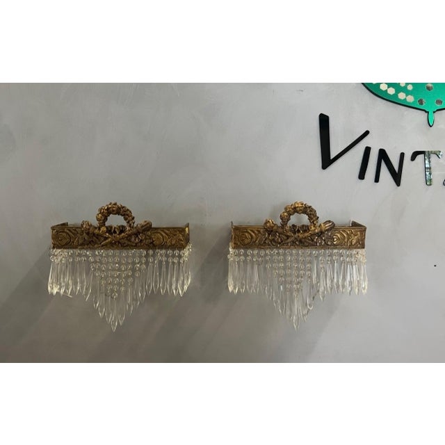 Up for consideration is a beautiful vintage pair of gold and crystal wall sconces. These would look lovely in your home,...