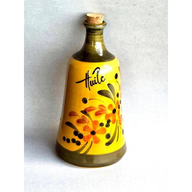 Offered is a charming hand painted ceramic oil decanter/cruet from the Vallauris region in the South of France. It...