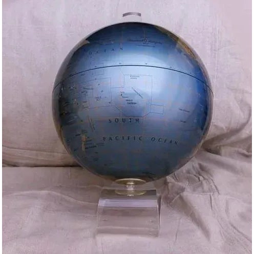 A vintage 12” world globe on a Lucite stand made by Replogle, Diamond Marquise Series. Manufactured in a deco style in...