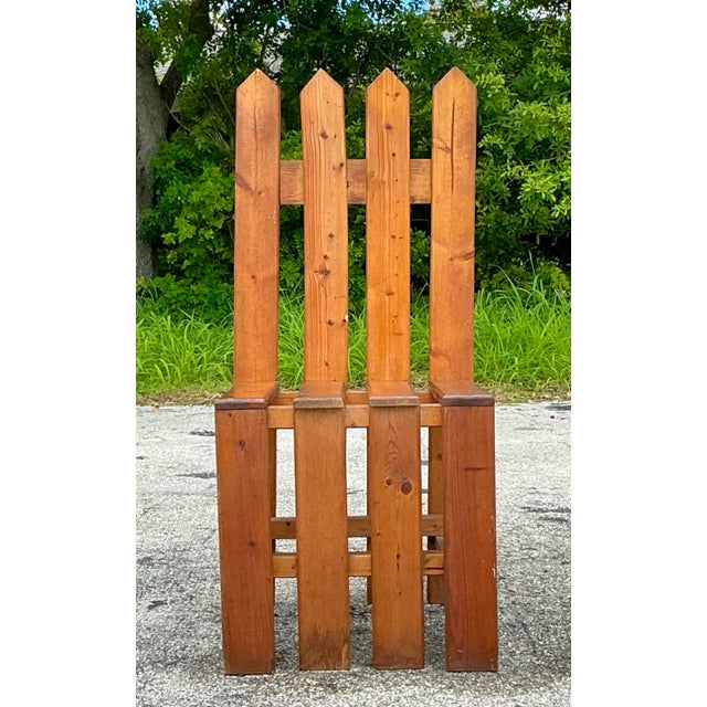 Add a touch of rustic charm to your home with the Vintage Boho Picket Fence Chair. This unique piece combines bohemian...