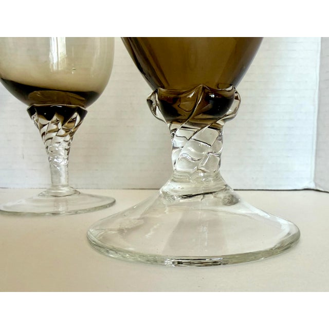 Here is a beautiful vintage Italian, Murano-style hand-blown glass decanter and wine glass set, dating to the mid-century....