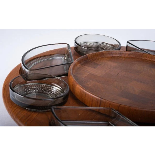Teak carousel with 8 glass bowls from Kastrup Glasværk, Danish design, 1960s. 4 triangle and 4 round bowls. Beautiful and...