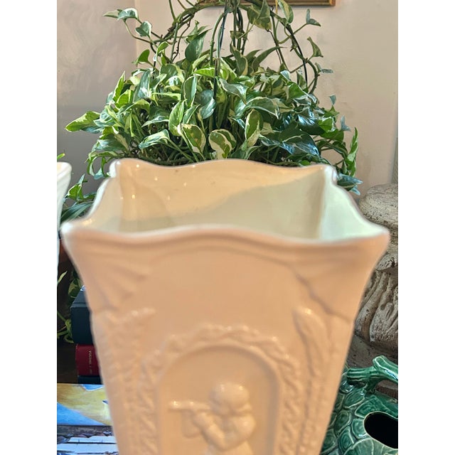 Late 20th Century Late 20th Century Neoclassical Cream Ceramic Putti Pedestal Vases – A Pair For Sale - Image 5 of 12