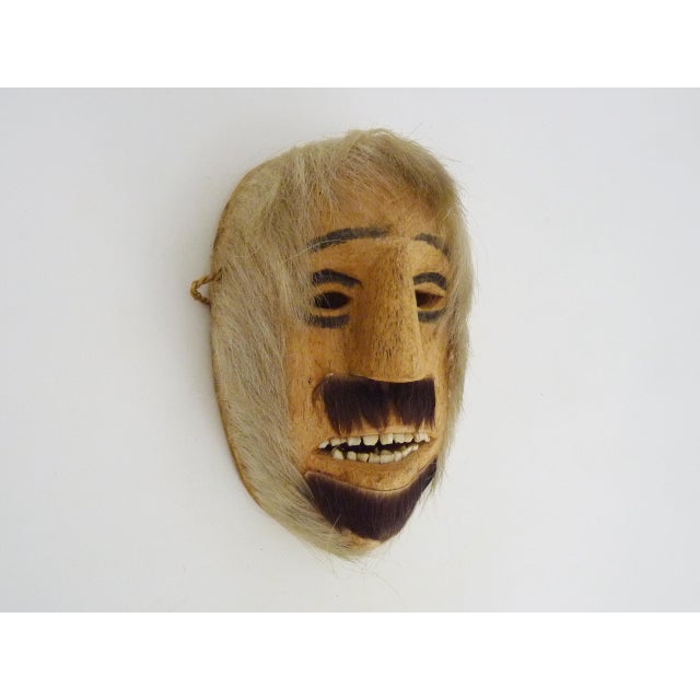 Carnival Mask, Canton of Valais, Switzerland, Lotschental Antique pine wood mask with polychrome eyebrows and eyes....