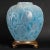 Vase ''parakeets'' in opalescent double-layer molded '-pressed' glass and enhanced with a blue patina. decorated over its...