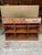 A slanted top library writing desk from Baker Furniture Stately Homes Woburn Abbey Collection. This desk features a...