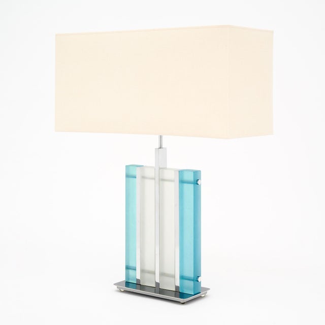 Murano glass aqua “tormalina” slab lamps with beautiful polished chrome structures. We love the hand-blown slab glass...