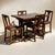 Extending Draw Leaf Table & 4 Chairs Sizes 167 cms in length open, 106 cms with leaves closed, 76 cms wide, 77 cms high....