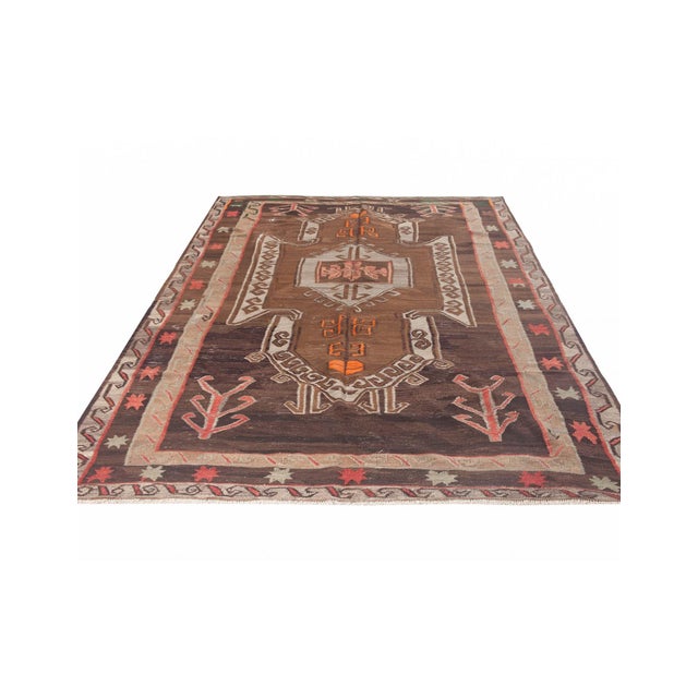 Vintage handwoven decorative kilim rug from Kars region of Turkey. Approximately 50-60 years old. In very good condition.