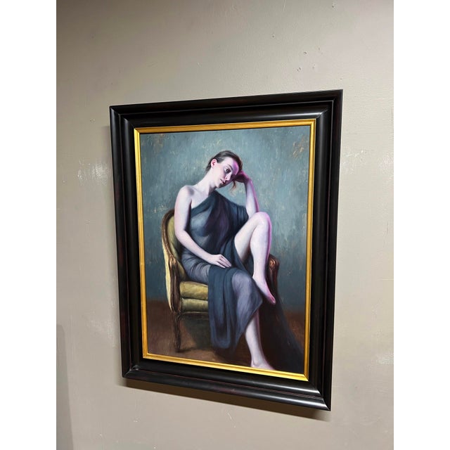 The artwork presents a figure seated in an elegant chair, draped in a flowing garment that softly contrasts with the muted...