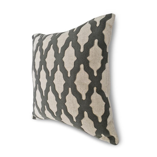 Bring understated global character to your space with this embroidered linen pillow. Crafted with a natural linen cover,...