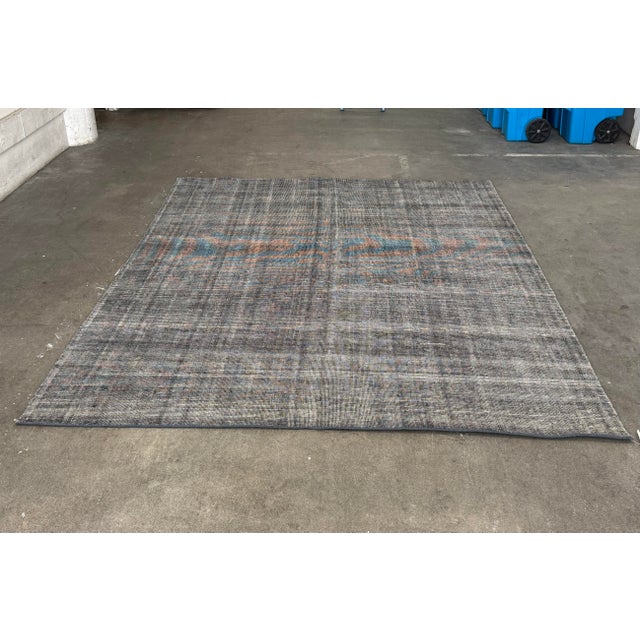 Design Plus Gallery presents a 9ft x 12ft Contemporary Woven Wool Area Rug. This low-profile rug showcases a finely woven...