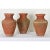 Dimensions: 19 ½” H x 13” W x 13” D A beautiful set of three, unglazed terracotta olive jars from Turkey, circa 1930, by...