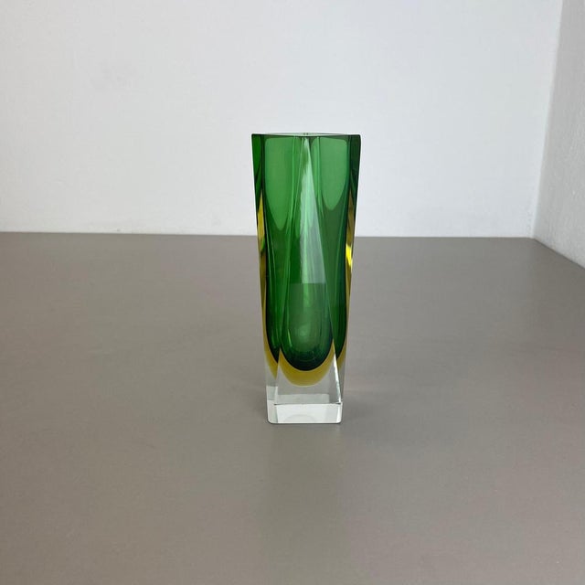 This original vintage glass vases was designed by Flavio Poli attributed and produced in the 1970s in Murano, Italy. It is...