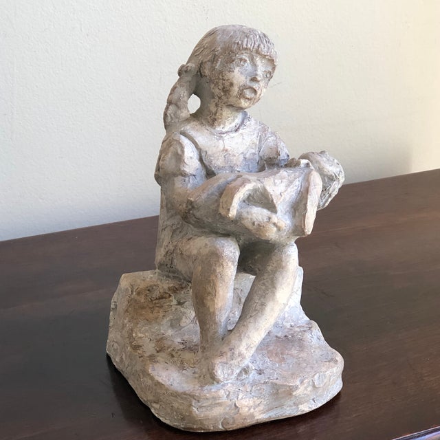 Offering a lovely, circa 1970 Klara Sever sculpture titled 'Babe in Arms' produced by Austin Productions -- a museum...