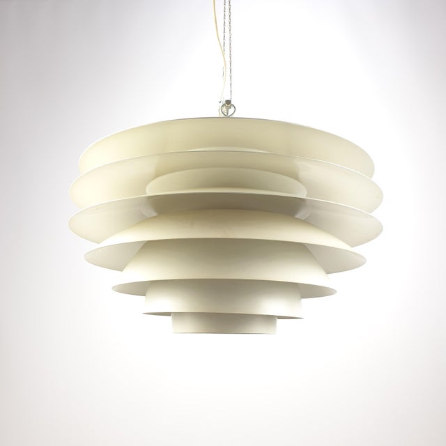 This iconic "Verona" pendant lamp is a masterpiece of Scandinavian mid-century modern lighting design. Designed in 1968 by...