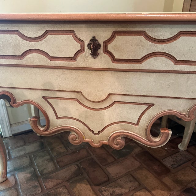 A well made piece of furniture that can go in a foyer or anywhere else a long table is needed. Has one drawer the length...