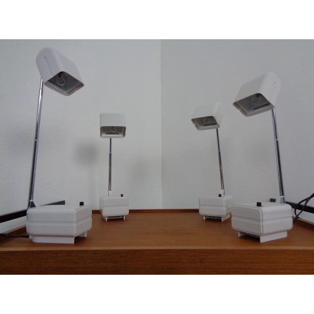 Adjustable, German desk lamps from the 1970s. Clearness adjustable in 2 stages via the switch. Adjustable height of...