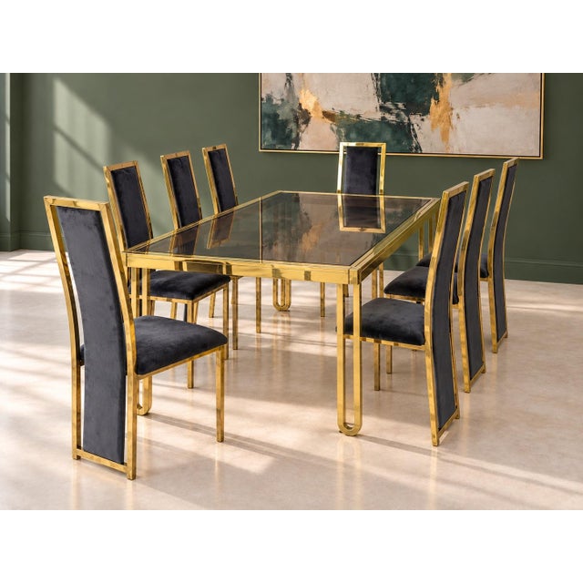 Beautiful Hollywood regency style smoked glass extendable metal table and 8 chairs! A striking set of eight vintage dining...