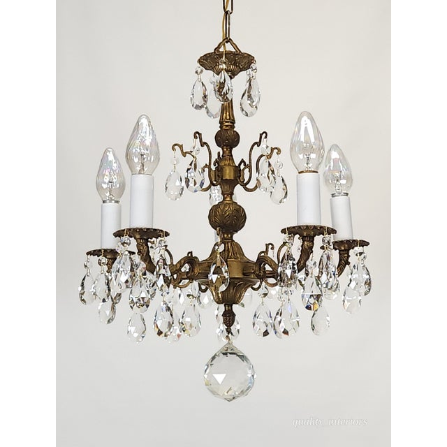 Offered for your consideration is an Antique 5 Arm 5 Light Dark Patina Ornate Brass Cut Lead Glass Crystal Chandelier. The...