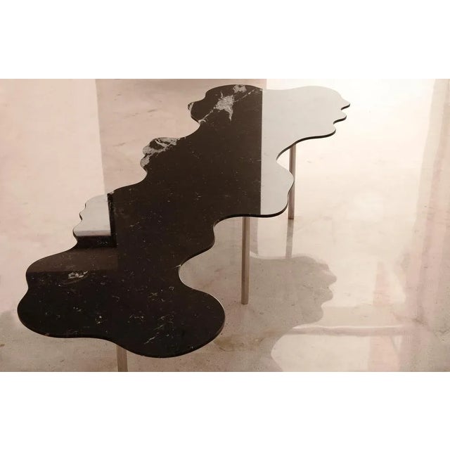 Lago low table by iterare arquitectos dimensions: d186 x w62 x h43 cm materials: stone (in seven options), polished...