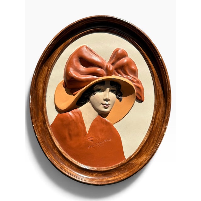 Vintage 1975 Duncan Ceramic Products wall plaque featuring a high-relief portrait of a Gibson Girl-style lady in an...