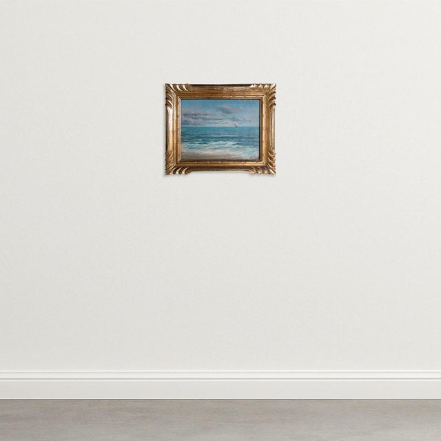 This serene impressionist seascape, signed by an as-yet unidentified artist, captures the quiet majesty of sea and sky in...