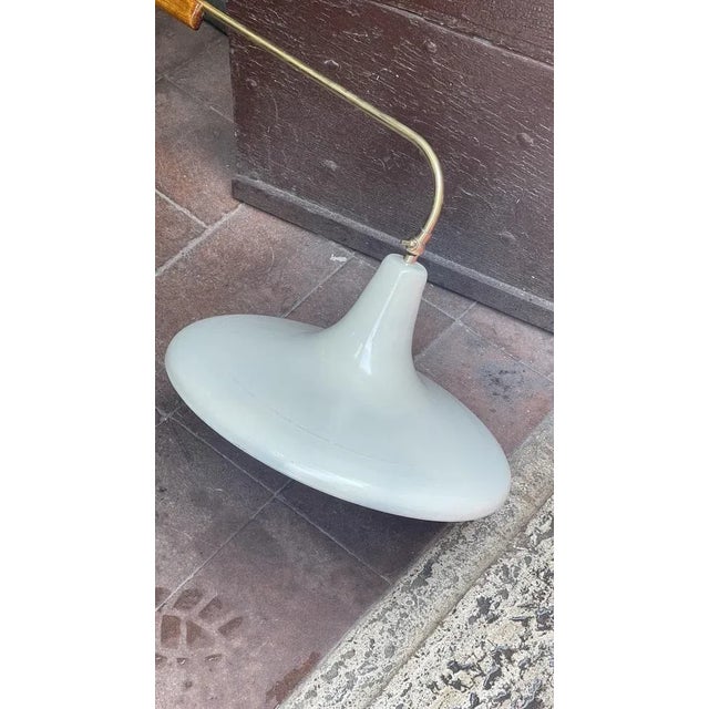 Applique Stilnovo in wood and brass, present in various publications, extremely rare, the applique can rotate 180 degrees,...