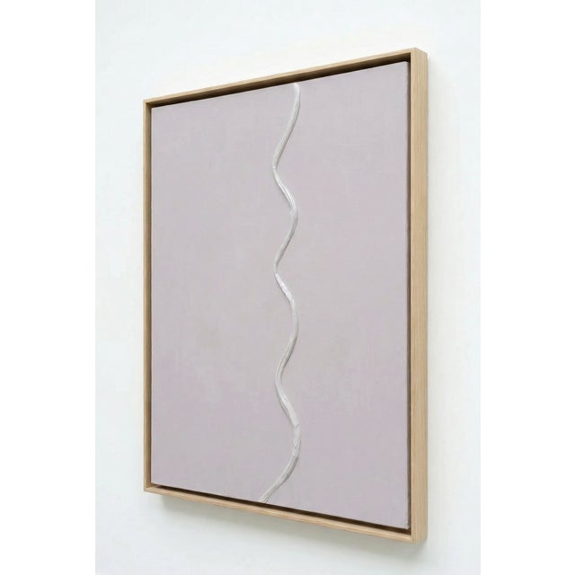 'Curve' in Lavender featuring a wavy textured detail in lavender paint an white oak frame. Artist and designer Victoria...