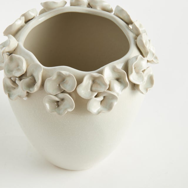 The multifloral design of this vase is truly extraordinary. The sculpted buds are handapplied and each piece is uniquely...