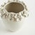 The multifloral design of this vase is truly extraordinary. The sculpted buds are handapplied and each piece is uniquely...