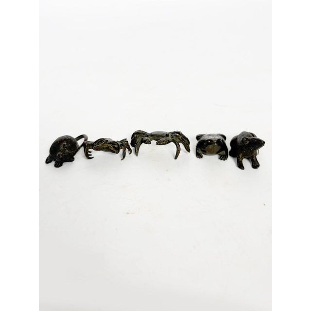Set of small bronze animal figurines, France, circa 1950. A charming set of several finely stylized animals. Each piece...