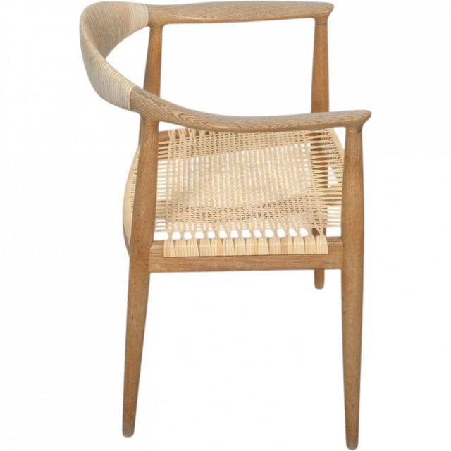 Hans Wegner The Chair, model JH501, with a frame of oak and back and seat of wicker. The chair is from the 1960s but was...