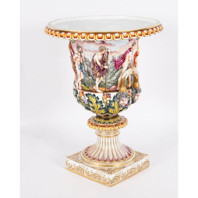 A fine pair of Antique Italian Naples Capodimonte porcerlain campana vases of impressive scale, bearing the Naples...