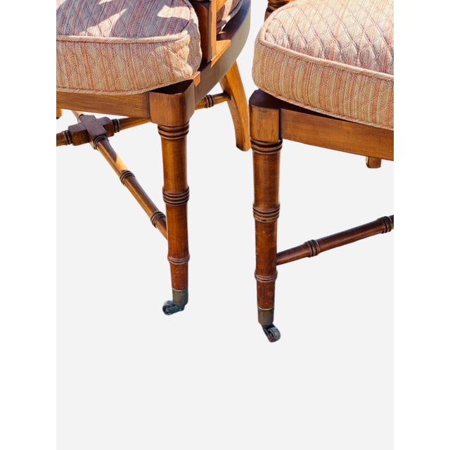 Tooled leather top card/game table on cabriole legs with four matching faux bamboo armchairs. Seat cushions are original...