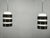 Rare pair of original Mid-Century Modern pendant lights manufactured by Drupol in Czechoslovakia during the 1960s. The...