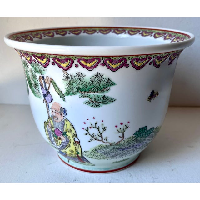 This lovely vintage hand-painted porcelain Chinese Famille Verte cachepot features classic figures in traditional robes...
